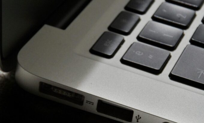 The-Zombie-SaaS-Audit_-Finding-the-3-Apps-Your-Former-Employees-Still-Access-scaled.jpg Free Detailed view of a silver laptop showing keyboard and multiple ports. Stock Photo
