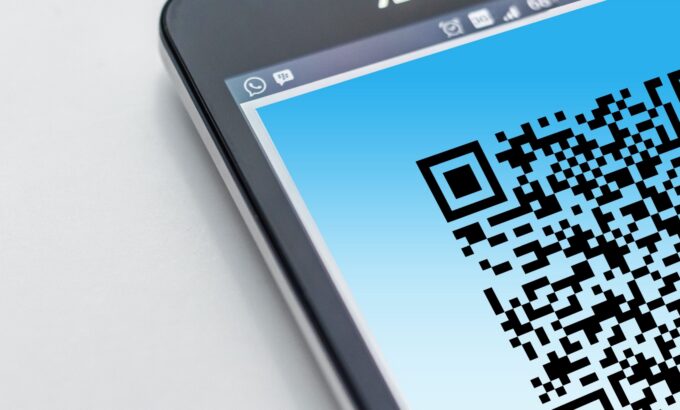pexels-pixabay-278430-scaled.jpg Free High-resolution close-up of a smartphone displaying a QR code on its screen. Stock Photo