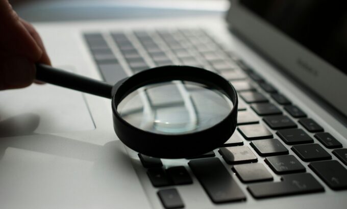 agence-olloweb-d9ILr-dbEdg-unsplash.jpg magnifying glass near gray laptop computer